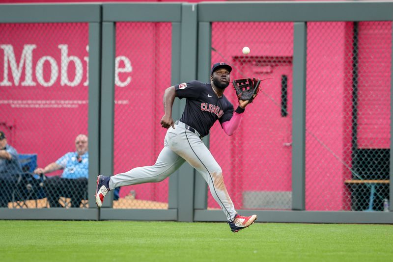 Jun 28, 2023; Kansas City, Missouri, USA; Cleveland Guardians outfield Jhonkensy Noel (43) catches a pop fly during the fifth inning against the Kansas City Royals at Kauffman Stadium. Mandatory Credit: William Purnell-USA TODAY Sports