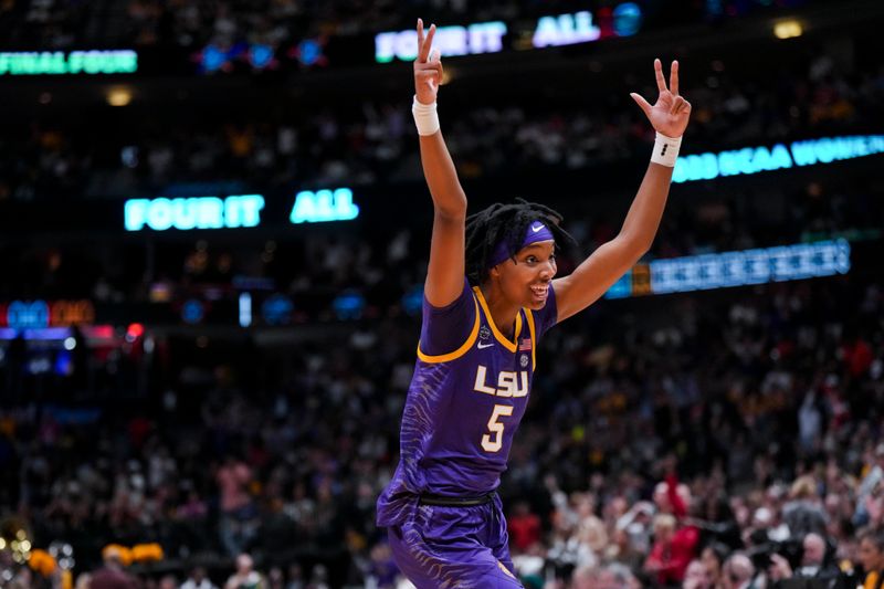 Apr 2, 2023; Dallas, TX, USA; LSU Lady Tigers forward Sa'Myah Smith (5) reacts against the Iowa Hawkeyes in the first half during the final round of the Women's Final Four NCAA tournament at the American Airlines Center. Mandatory Credit: Kirby Lee-USA TODAY Sports