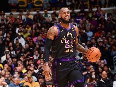 LOS ANGELES, CA - DECEMBER 18: LeBron James #23 of the Los Angeles Lakers handles the ball during the game   on December 18, 2023 at Crypto.Com Arena in Los Angeles, California. NOTE TO USER: User expressly acknowledges and agrees that, by downloading and/or using this Photograph, user is consenting to the terms and conditions of the Getty Images License Agreement. Mandatory Copyright Notice: Copyright 2023 NBAE (Photo by Adam Pantozzi/NBAE via Getty Images)
