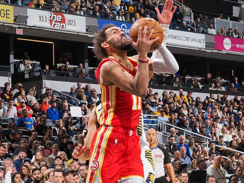 INDIANAPOLIS, IN - FEBRUARY 1: Trae Young #11 of the Atlanta Hawks drives to the basket during the game against the Indiana Pacers on February 1, 2025 at Gainbridge Fieldhouse in Indianapolis, Indiana. NOTE TO USER: User expressly acknowledges and agrees that, by downloading and or using this Photograph, user is consenting to the terms and conditions of the Getty Images License Agreement. Mandatory Copyright Notice: Copyright 2025 NBAE (Photo by Ron Hoskins/NBAE via Getty Images)