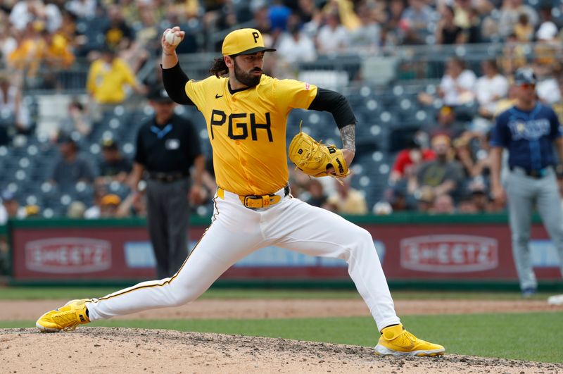 Jun 23, 2024; Pittsburgh, Pennsylvania, USA;  Pittsburgh Pirates relief pitcher Colin Holderman (35) pitches against the Tampa Bay Rays during the eighth inning at PNC Park. Mandatory Credit: Charles LeClaire-USA TODAY Sports