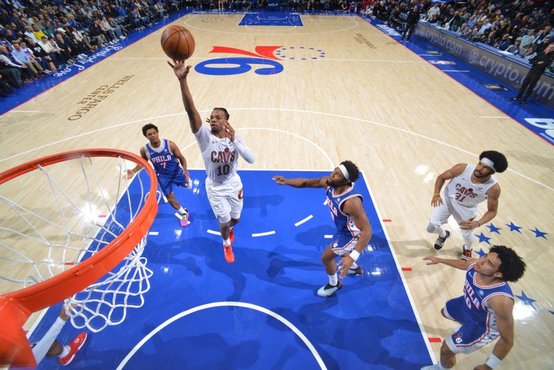 PHILADELPHIA, PA - NOVEMBER 13: Darius Garland #10 of the Cleveland Cavaliers drives to the basket during the game against the Philadelphia 76ers on November 13, 2024 at the Wells Fargo Center in Philadelphia, Pennsylvania NOTE TO USER: User expressly acknowledges and agrees that, by downloading and/or using this Photograph, user is consenting to the terms and conditions of the Getty Images License Agreement. Mandatory Copyright Notice: Copyright 2024 NBAE (Photo by Jesse D. Garrabrant/NBAE via Getty Images)