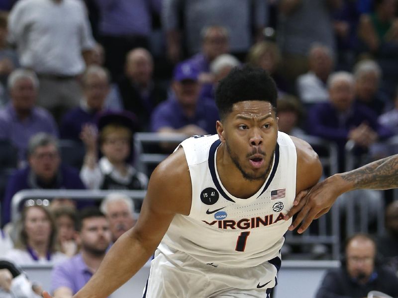 Mar 16, 2023; Orlando, FL, USA; Virginia Cavaliers forward Jayden Gardner (1) dribbles the ball during the first half against the Furman Paladins at Amway Center. Mandatory Credit: Russell Lansford-USA TODAY Sports