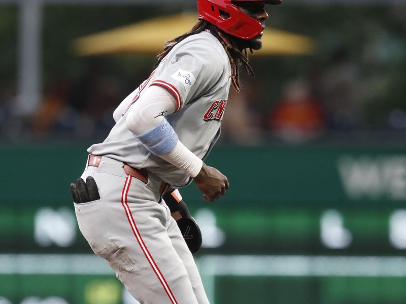 Jun 17, 2024; Pittsburgh, Pennsylvania, USA;  Cincinnati Reds shortstop Elly De La Cruz (44) takes a lead off of second base against the Pittsburgh Pirates during the third inning at PNC Park. Mandatory Credit: Charles LeClaire-USA TODAY Sports