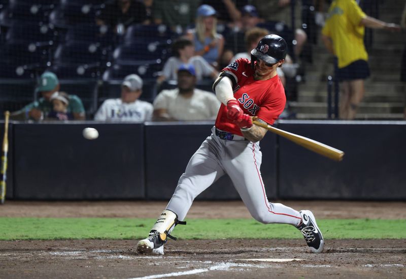 Sep 19, 2025; Tampa, Florida, USA;  Boston Red Sox outfielder Jarren Duran (16) hits a two-run home run during the seventh inning against the Tampa Bay Rays at George M. Steinbrenner Field. Mandatory Credit: Kim Klement Neitzel-Imagn Images