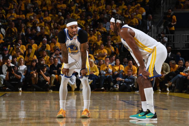 SAN FRANCISCO, CA - MAY 10: Gary Payton II #0 and Buddy Hield #7 of the Golden State Warriors look on during the game against the Minnesota Timberwolves during Round 2 Game 3 of the 2025 NBA Playoffs on May 10, 2025 at Chase Center in San Francisco, California. NOTE TO USER: User expressly acknowledges and agrees that, by downloading and or using this photograph, user is consenting to the terms and conditions of Getty Images License Agreement. Mandatory Copyright Notice: Copyright 2025 NBAE(Photo by Noah Graham/NBAE via Getty Images)