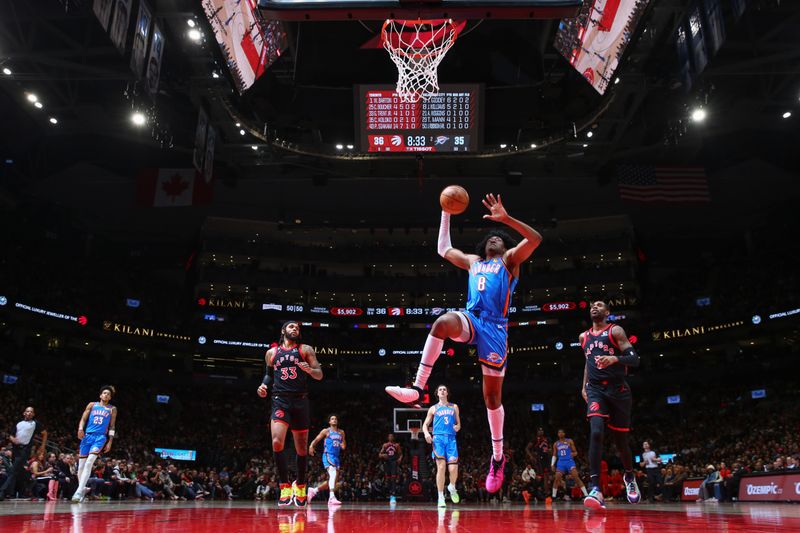 TORONTO, CANADA - MARCH 16:  Jalen Williams #8 of the Oklahoma City Thunder goes to the basket during the game on March 16, 2023 at the Scotiabank Arena in Toronto, Ontario, Canada.  NOTE TO USER: User expressly acknowledges and agrees that, by downloading and or using this Photograph, user is consenting to the terms and conditions of the Getty Images License Agreement.  Mandatory Copyright Notice: Copyright 2023 NBAE (Photo by Vaughn Ridley/NBAE via Getty Images)
