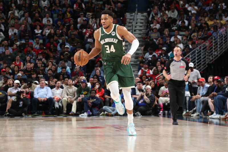 NEW ORLEANS, LA - MARCH 28: Giannis Antetokounmpo #34 of the Milwaukee Bucks handles the ball during the game on March 28, 2024 at the Smoothie King Center in New Orleans, Louisiana. NOTE TO USER: User expressly acknowledges and agrees that, by downloading and or using this Photograph, user is consenting to the terms and conditions of the Getty Images License Agreement. Mandatory Copyright Notice: Copyright 2024 NBAE (Photo by Layne Murdoch Jr./NBAE via Getty Images)