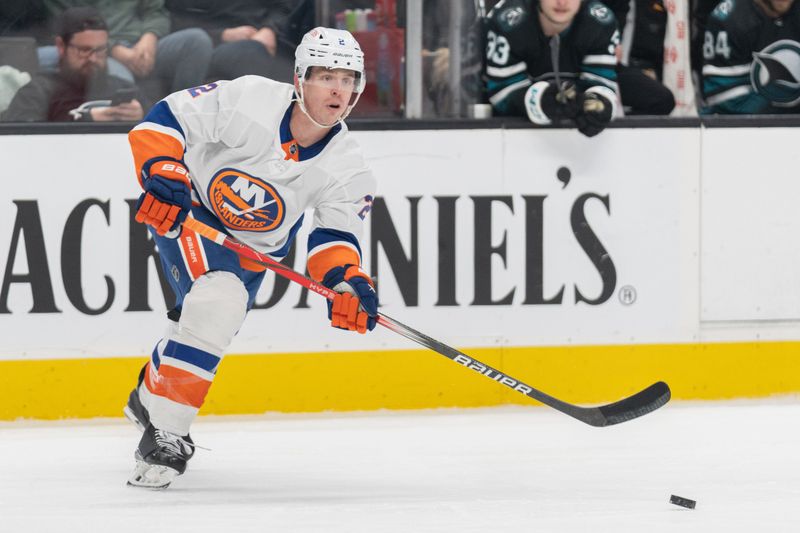 Mar 7, 2024; San Jose, California, USA; New York Islanders defenseman Mike Reilly (2) passes the puck during the third period against the San Jose Sharks at SAP Center at San Jose. Mandatory Credit: Stan Szeto-USA TODAY Sports