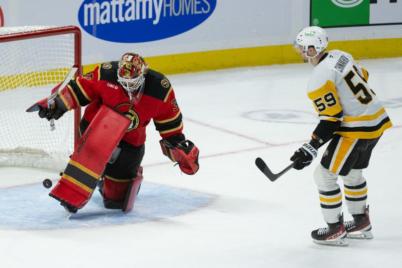 Mar 26, 2026; Ottawa, Ontario, CAN; Ottawa Senators goalie Linus Ullmark (35) makes a save on a shot from Pittsburgh Penguins right wing Egor Chinakhov (59) in a shootout at the Canadian Tire Centre. Mandatory Credit: Marc DesRosiers-IMAGN Images