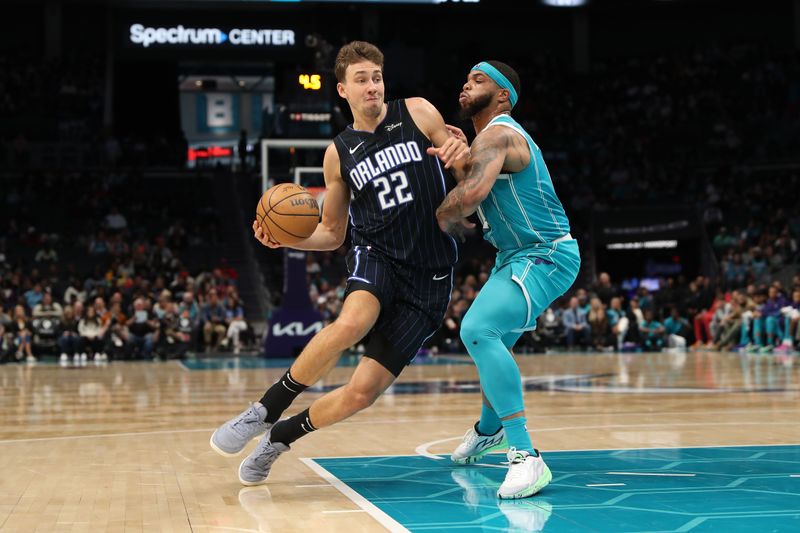 CHARLOTTE, NC - APRIL 5:  Franz Wagner #22 of the Orlando Magic drives to the basket during the game against the Charlotte Hornets on April 5, 2024 at Spectrum Center in Charlotte, North Carolina. NOTE TO USER: User expressly acknowledges and agrees that, by downloading and or using this photograph, User is consenting to the terms and conditions of the Getty Images License Agreement.  Mandatory Copyright Notice:  Copyright 2024 NBAE (Photo by Brock Williams-Smith/NBAE via Getty Images)