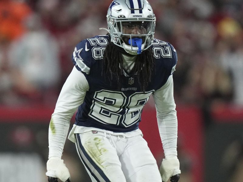 Dallas Cowboys safety Malik Hooker (28) backpedals he as watches the quarterback whilst defending during an NFL wild-card football game against the Tampa Bay Buccaneers, Monday, Jan. 16, 2023, in Tampa, Fla. (AP Photo/Peter Joneleit)