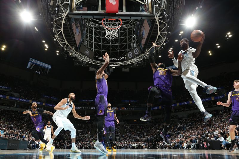 MINNEAPOLIS, MN -  DECEMBER 2: Julius Randle #30 of the Minnesota Timberwolves looks to pass the ball during the game against the Los Angeles Lakers on December 2, 2024 at Target Center in Minneapolis, Minnesota. NOTE TO USER: User expressly acknowledges and agrees that, by downloading and or using this Photograph, user is consenting to the terms and conditions of the Getty Images License Agreement. Mandatory Copyright Notice: Copyright 2024 NBAE (Photo by David Sherman/NBAE via Getty Images)