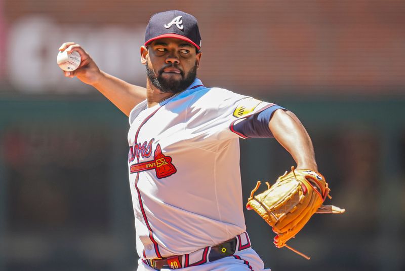 May 20, 2024; Cumberland, Georgia, USA; Atlanta Braves starting pitcher Reynaldo Lopez (40) pitches against the San Diego Padres during the first inning at Truist Park. Mandatory Credit: Dale Zanine-USA TODAY Sports