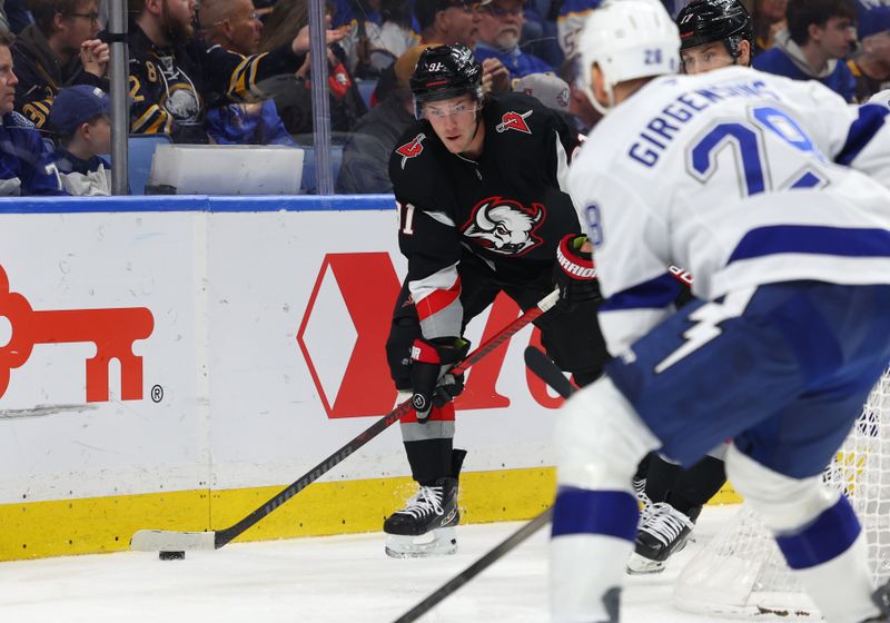 Mar 8, 2026; Buffalo, New York, USA;  Buffalo Sabres right wing Josh Doan (91) looks to make a pass during the third period against the Tampa Bay Lightning at KeyBank Center. Mandatory Credit: Timothy T. Ludwig-Imagn Images
