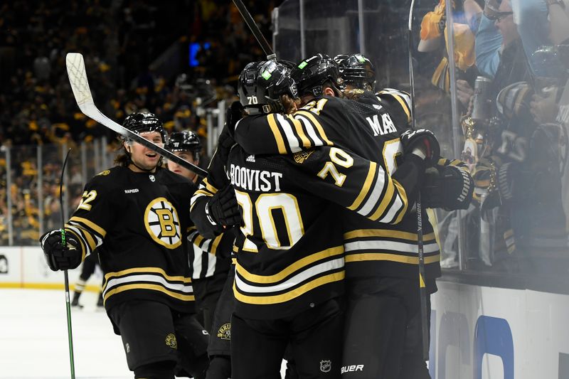 Apr 20, 2024; Boston, Massachusetts, USA; The Boston Bruins celebrate a goal during the first period in game one of the first round of the 2024 Stanley Cup Playoffs against the Toronto Maple Leafs at TD Garden. Mandatory Credit: Bob DeChiara-USA TODAY Sports