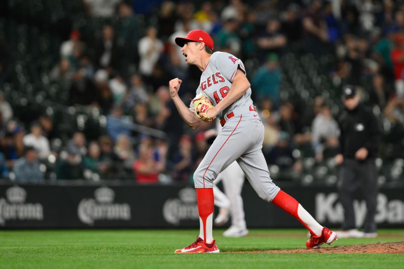 Sep 11, 2023; Seattle, Washington, USA; Los Angeles Angels relief pitcher Jimmy Herget (46) celebrates after defeating the Seattle Mariners at T-Mobile Park. Mandatory Credit: Steven Bisig-USA TODAY Sports