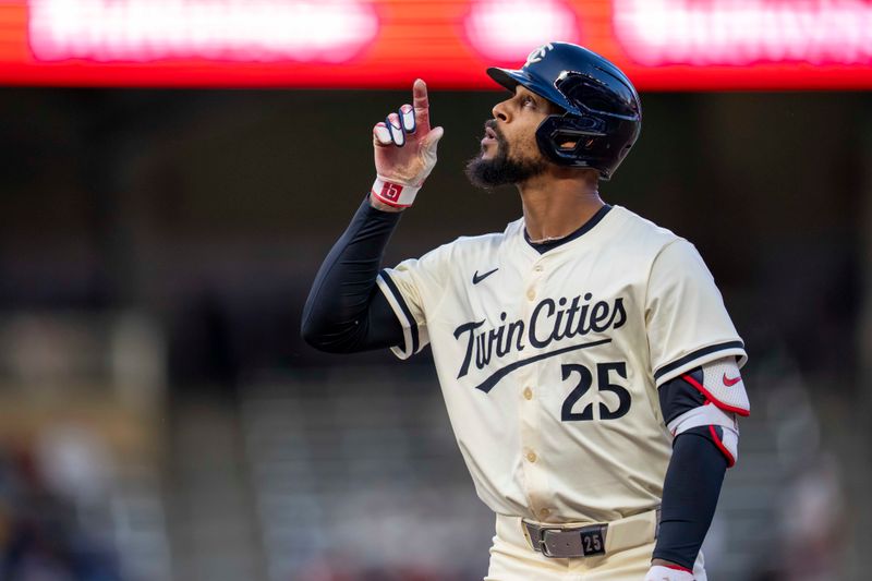 May 7, 2025; Minneapolis, Minnesota, USA; Minnesota Twins center fielder Byron Buxton (25) celebrates hitting a single against the Baltimore Orioles in the fifth inning at Target Field. Mandatory Credit: Jesse Johnson-Imagn Images