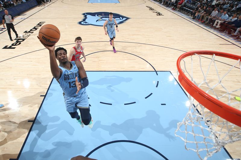 MEMPHIS, TN - OCTOBER 28: Jaren Jackson Jr. #13 of the Memphis Grizzlies drives to the basket during the game against the Chicago Bulls on October 28, 2024 at FedExForum in Memphis, Tennessee. NOTE TO USER: User expressly acknowledges and agrees that, by downloading and or using this photograph, User is consenting to the terms and conditions of the Getty Images License Agreement. Mandatory Copyright Notice: Copyright 2024 NBAE (Photo by Joe Murphy/NBAE via Getty Images)