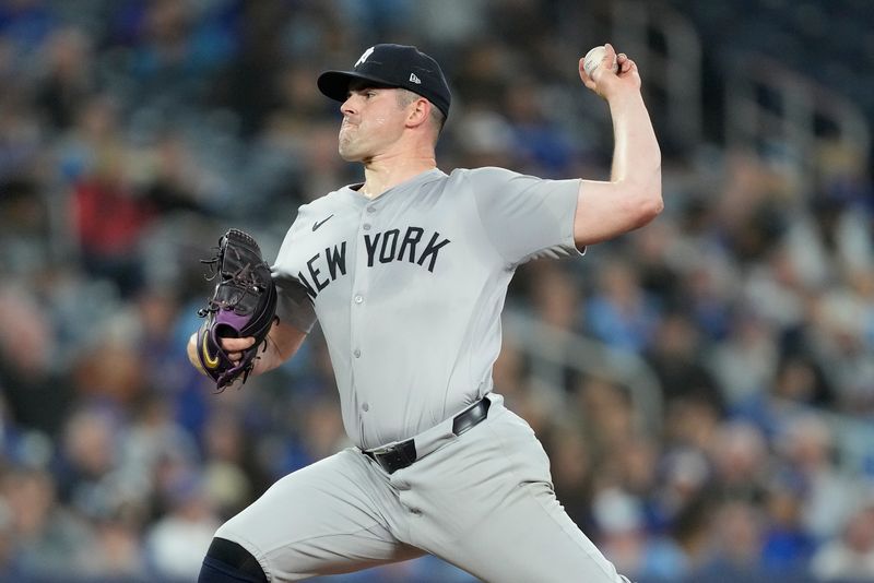 Apr 16, 2024; Toronto, Ontario, CAN; New York Yankees starting pitcher Carlos Rodon (55) pitches to the Toronto Blue Jays during the fourth inning at Rogers Centre. Mandatory Credit: John E. Sokolowski-USA TODAY Sports