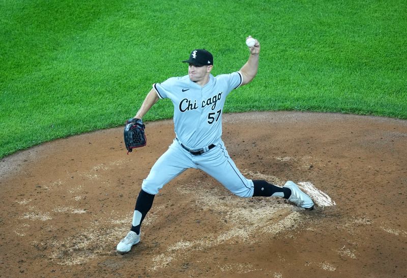 Aug 19, 2023; Denver, Colorado, USA; Chicago White Sox relief pitcher Tanner Banks (57) delivers a pitch in the fifth inning against the Colorado Rockies at Coors Field. Mandatory Credit: Ron Chenoy-USA TODAY Sports