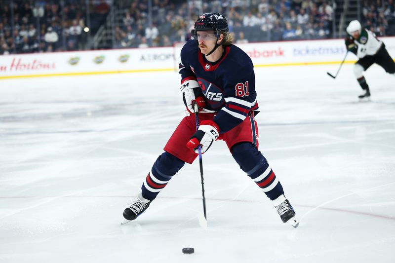 Nov 18, 2023; Winnipeg, Manitoba, CAN;  Winnipeg Jets forward Kyle Connor (81) looks to take a shot against the Arizona Coyotes during the second period at Canada Life Centre. Mandatory Credit: Terrence Lee-USA TODAY Sports