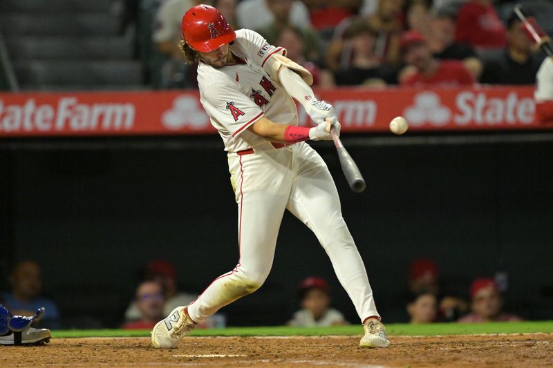 Sep 23, 2025; Anaheim, California, USA;  Los Angeles Angels center fielder Bryce Teodosio (22) hits a two-run shot for his first major league home run during the fifth inning against the Kansas City Royals at Angel Stadium. Mandatory Credit: Jayne Kamin-Oncea-Imagn Images