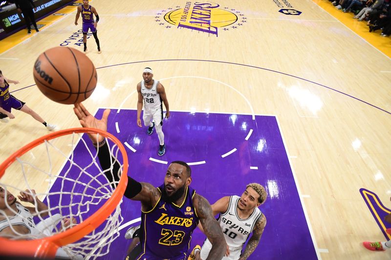 LOS ANGELES, CA - FEBRUARY 23:  LeBron James #23 of the Los Angeles Lakers goes to the basket during the game on February 23, 2024 at Crypto.Com Arena in Los Angeles, California. NOTE TO USER: User expressly acknowledges and agrees that, by downloading and/or using this Photograph, user is consenting to the terms and conditions of the Getty Images License Agreement. Mandatory Copyright Notice: Copyright 2024 NBAE (Photo by Adam Pantozzi/NBAE via Getty Images)