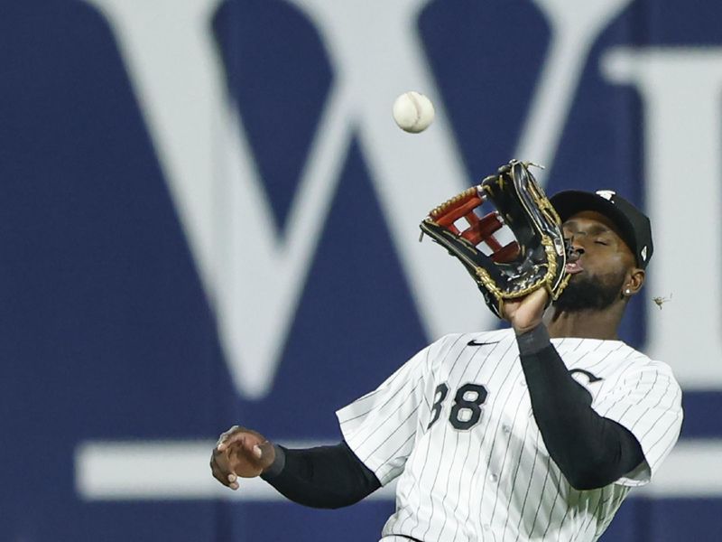 May 13, 2023; Chicago, Illinois, USA; Chicago White Sox center fielder Luis Robert Jr. (88) catches a fly ball hit by Houston Astros center fielder Jake Meyers (not pictured) during the ninth inning at Guaranteed Rate Field. Mandatory Credit: Kamil Krzaczynski-USA TODAY Sports