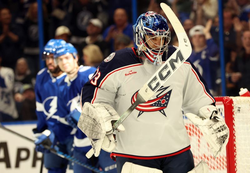 Apr 9, 2024; Tampa, Florida, USA; Columbus Blue Jackets goaltender Jet Greaves (73) looks on after he gave up a goal to Tampa Bay Lightning center Brayden Point (21) during the first period at Amalie Arena. Mandatory Credit: Kim Klement Neitzel-USA TODAY Sports