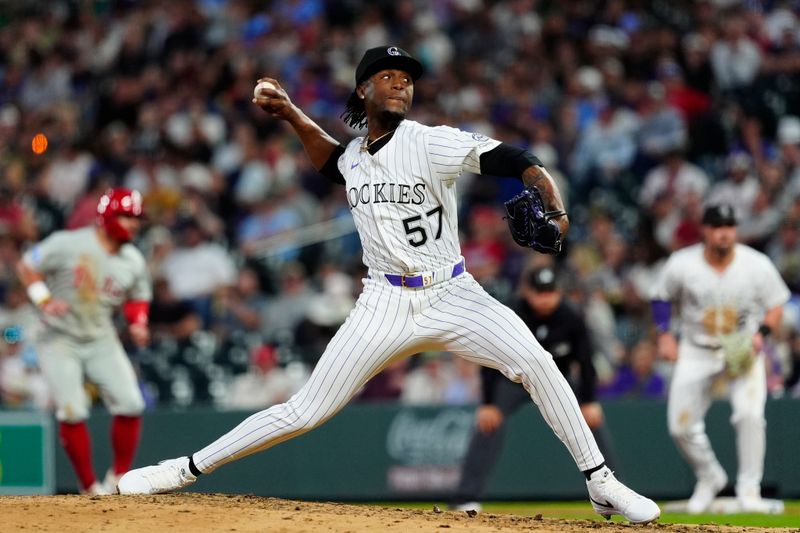 May 21, 2025; Denver, Colorado, USA; Colorado Rockies pitcher Carson Palmquist (45) delivers a pitch in the sixth inning against the Philadelphia Phillies at Coors Field. Mandatory Credit: Ron Chenoy-Imagn Images