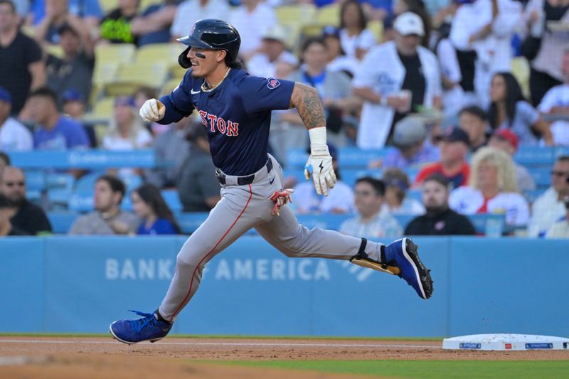 Jul 19, 2024; Los Angeles, California, USA;  Boston Red Sox outfielder Jarren Duran (16) hits a lead off double in the first inning against the Los Angeles Dodgers at Dodger Stadium. Mandatory Credit: Jayne Kamin-Oncea-USA TODAY Sports