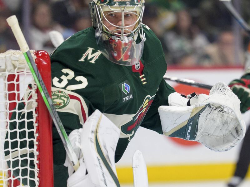 Feb 2, 2026; Saint Paul, Minnesota, USA; Minnesota Wild goaltender Filip Gustavsson (32) watches play in the corner against the Montreal Canadiens in the first period at Grand Casino Arena. Mandatory Credit: Matt Blewett-Imagn Images