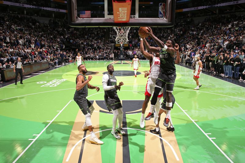 MINNEAPOLIS, MN -  NOVEMBER 26: Anthony Edwards #5 of the Minnesota Timberwolves drives to the basket during the game against the Houston Rockets during the Emirates NBA Cup game on November 26, 2024 at Target Center in Minneapolis, Minnesota. NOTE TO USER: User expressly acknowledges and agrees that, by downloading and or using this Photograph, user is consenting to the terms and conditions of the Getty Images License Agreement. Mandatory Copyright Notice: Copyright 2024 NBAE (Photo by David Sherman/NBAE via Getty Images)