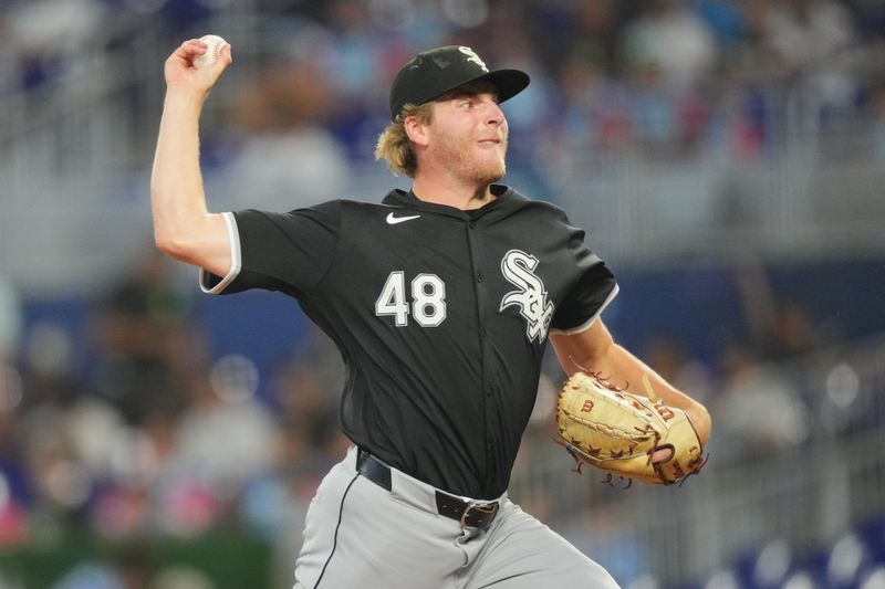 Jul 7, 2024; Miami, Florida, USA;  Chicago White Sox pitcher Jonathan Cannon (48) pitches in the first inning against the Miami Marlins at loanDepot Park. Mandatory Credit: Jim Rassol-USA TODAY Sports