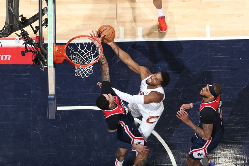 WASHINGTON, DC -? FEBRUARY 7: Kyle Kuzma #33 of the Washington Wizards blocks the shot by Donovan Mitchell #45 of the Cleveland Cavaliers during the game on February 7, 2024 at Capital One Arena in Washington, DC. NOTE TO USER: User expressly acknowledges and agrees that, by downloading and or using this Photograph, user is consenting to the terms and conditions of the Getty Images License Agreement. Mandatory Copyright Notice: Copyright 2024 NBAE (Photo by Stephen Gosling/NBAE via Getty Images)