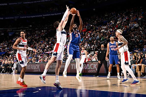 PHILADELPHIA, PA - DECEMBER 11: Joel Embiid #21 of the Philadelphia 76ers shoots the ball during the game against the Washington Wizards on December 11, 2023 at the Wells Fargo Center in Philadelphia, Pennsylvania NOTE TO USER: User expressly acknowledges and agrees that, by downloading and/or using this Photograph, user is consenting to the terms and conditions of the Getty Images License Agreement. Mandatory Copyright Notice: Copyright 2023 NBAE (Photo by David Dow/NBAE via Getty Images)