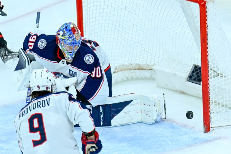 Jan 30, 2026; Chicago, Illinois, USA;  Columbus Blue Jackets goaltender Elvis Merzlikins (90) watches a goal scored by Chicago Blackhawks center Frank Nazar (not pictured) during the second period at the United Center. Mandatory Credit: Matt Marton-Imagn Images