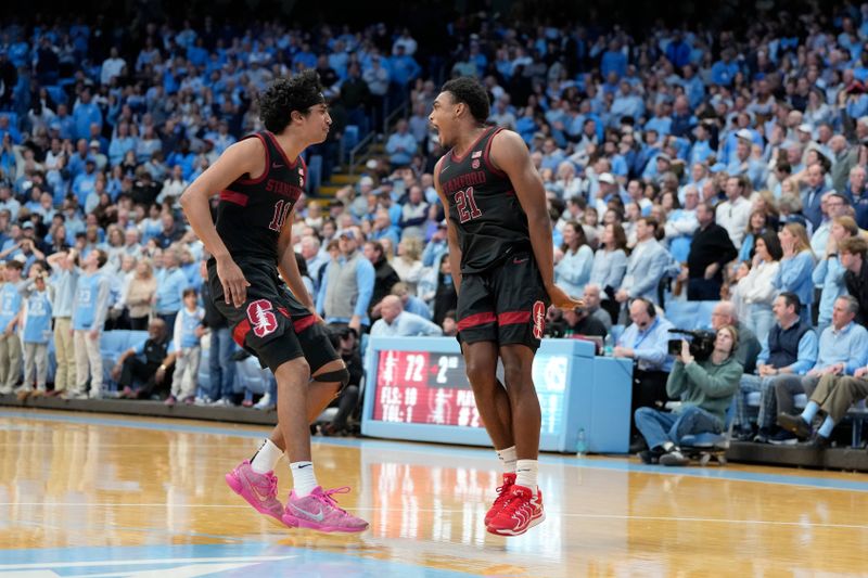 Jan 18, 2025; Chapel Hill, North Carolina, USA; Stanford Cardinal guard Jaylen Blakes (21) reacts with guard Ryan Agarwal (11) after hitting the game winning shot in the second half at Dean E. Smith Center. Mandatory Credit: Bob Donnan-Imagn Images