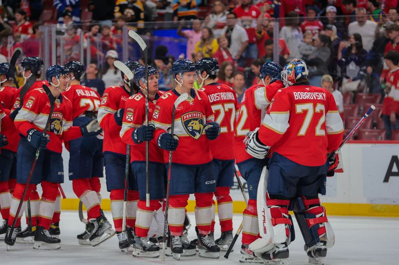 Apr 8, 2025; Sunrise, Florida, USA; Florida Panthers goaltender Sergei Bobrovsky (72) celebrates with defenseman Gustav Forsling (42) and center Anton Lundell (15) after the game against the Toronto Maple Leafs at Amerant Bank Arena. Mandatory Credit: Sam Navarro-Imagn Images