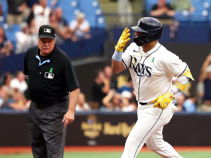 May 30, 2024; St. Petersburg, Florida, USA; Tampa Bay Rays third base Isaac Paredes (17) rounds the bases after hitting a two-run home run against the Oakland Athletics during the first inning at Tropicana Field. Mandatory Credit: Kim Klement Neitzel-USA TODAY Sports