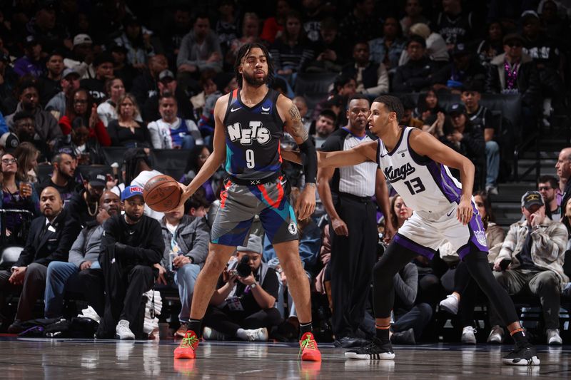 BROOKLYN, NY - APRIL 7: Trendon Watford #9 of the Brooklyn Nets handles the ball during the game against the Sacramento Kings on April 7, 2024 at Barclays Center in Brooklyn, New York. NOTE TO USER: User expressly acknowledges and agrees that, by downloading and or using this Photograph, user is consenting to the terms and conditions of the Getty Images License Agreement. Mandatory Copyright Notice: Copyright 2024 NBAE (Photo by Nathaniel S. Butler/NBAE via Getty Images)