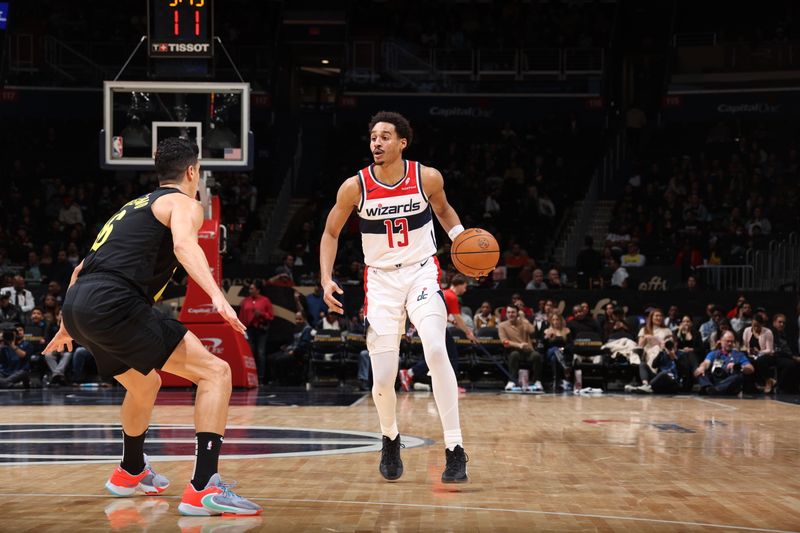 WASHINGTON, DC -? JANUARY 25: Jordan Poole #13 of the Washington Wizards handles the ball during the game  against the Utah Jazz on January 25, 2024 at Capital One Arena in Washington, DC. NOTE TO USER: User expressly acknowledges and agrees that, by downloading and or using this Photograph, user is consenting to the terms and conditions of the Getty Images License Agreement. Mandatory Copyright Notice: Copyright 2024 NBAE (Photo by Stephen Gosling/NBAE via Getty Images)