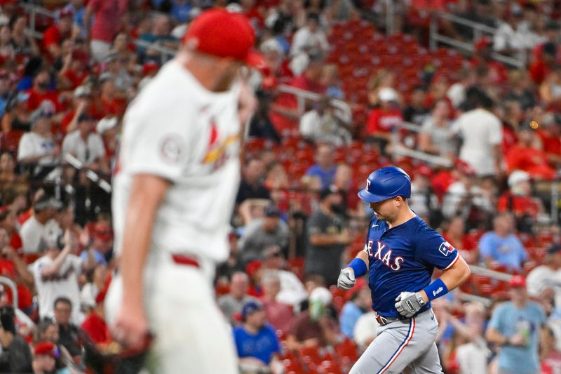 Jul 29, 2024; St. Louis, Missouri, USA;  Texas Rangers first baseman Nathaniel Lowe (30) runs the bases after hitting a two run home run off of St. Louis Cardinals relief pitcher Chris Roycroft (58) during the seventh inning at Busch Stadium. Mandatory Credit: Jeff Curry-USA TODAY Sports