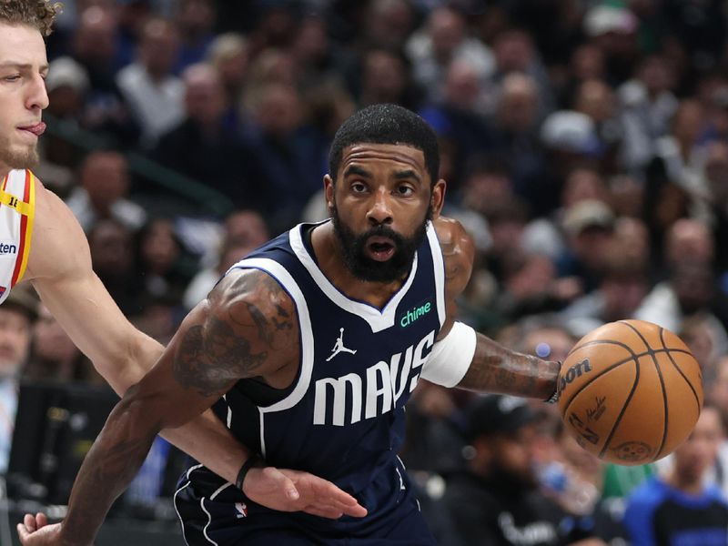 DALLAS, TX - FEBRUARY 12:  Kyrie Irving #11 of the Dallas Mavericks drives to the basket during the game against the Golden State Warriors on February 12, 2025 at American Airlines Center in Dallas, Texas. NOTE TO USER: User expressly acknowledges and agrees that, by downloading and or using this photograph, User is consenting to the terms and conditions of the Getty Images License Agreement. Mandatory Copyright Notice: Copyright 2025 NBAE (Photo by Tim Heitman/NBAE via Getty Images)