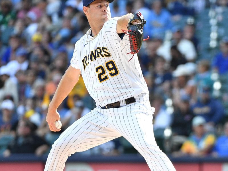 Aug 27, 2023; Milwaukee, Wisconsin, USA; Milwaukee Brewers relief pitcher Trevor Megill (29) delivers a pitch against the San Diego Padres in the ninth inning at American Family Field. Mandatory Credit: Michael McLoone-USA TODAY Sports