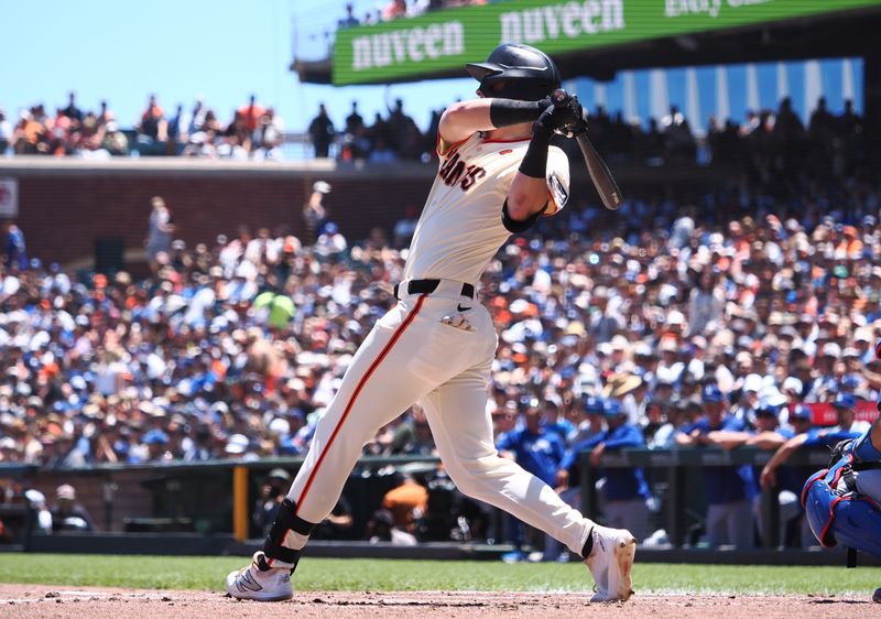 Jun 30, 2024; San Francisco, California, USA; San Francisco Giants second baseman Tyler Fitzgerald (49) hits a single against the Los Angeles Dodgers during the second inning at Oracle Park. Mandatory Credit: Kelley L Cox-USA TODAY Sports