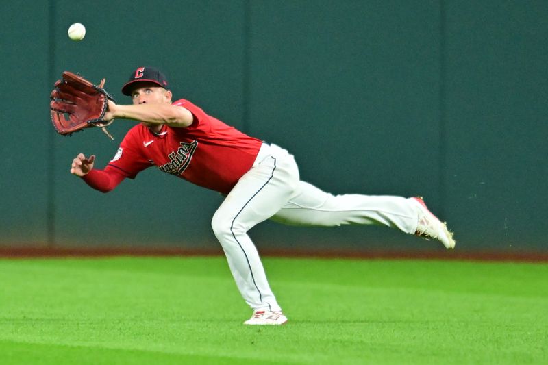 Sep 1, 2023; Cleveland, Ohio, USA; Cleveland Guardians center fielder Myles Straw (7) catches a ball hit by Tampa Bay Rays second baseman Brandon Lowe (not pictured) during the sixth inning at Progressive Field. Mandatory Credit: Ken Blaze-USA TODAY Sports