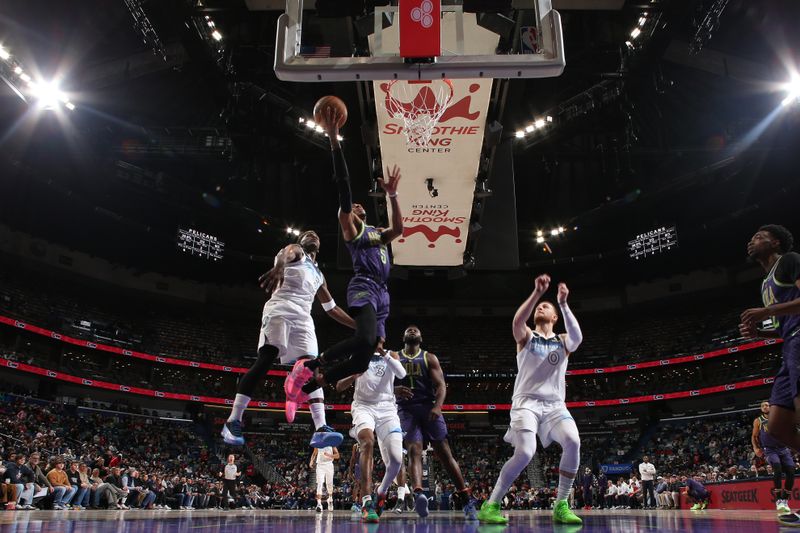 NEW ORLEANS, LA - JANUARY 7: Dejounte Murray #5 of the New Orleans Pelicans drives to the basket during the game against the Minnesota Timberwolves on January 7, 2025 at the Smoothie King Center in New Orleans, Louisiana. NOTE TO USER: User expressly acknowledges and agrees that, by downloading and or using this Photograph, user is consenting to the terms and conditions of the Getty Images License Agreement. Mandatory Copyright Notice: Copyright 2025 NBAE(Photo by Layne Murdoch Jr./NBAE via Getty Images)