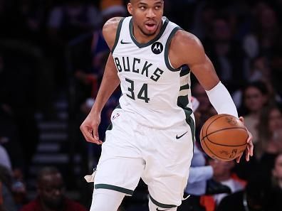 NEW YORK, NEW YORK - DECEMBER 23: Giannis Antetokounmpo #34 of the Milwaukee Bucks brings the ball up the court during the third quarter of the game against the New York Knicks at Madison Square Garden on December 23, 2023 in New York City. NOTE TO USER: User expressly acknowledges and agrees that, by downloading and or using this photograph, User is consenting to the terms and conditions of the Getty Images License Agreement. (Photo by Dustin Satloff/Getty Images)